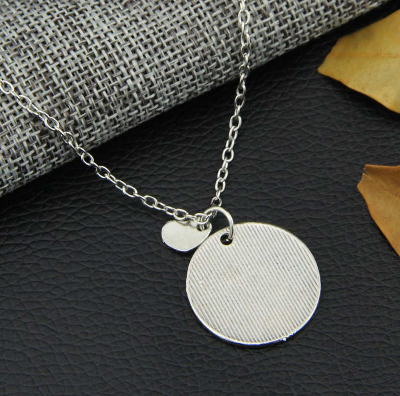 Grandmother and Grandchild Heart Necklace